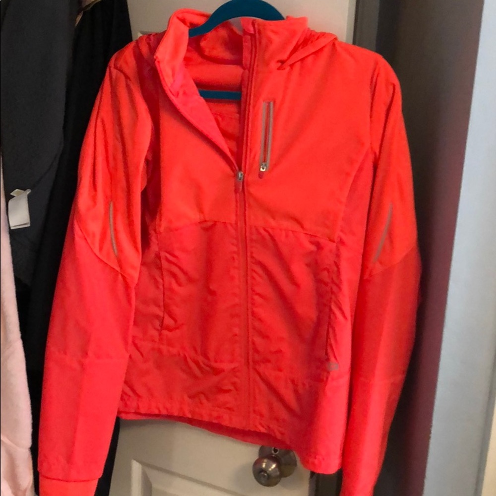 Bright pink/orange reflective Gap fit jacket.